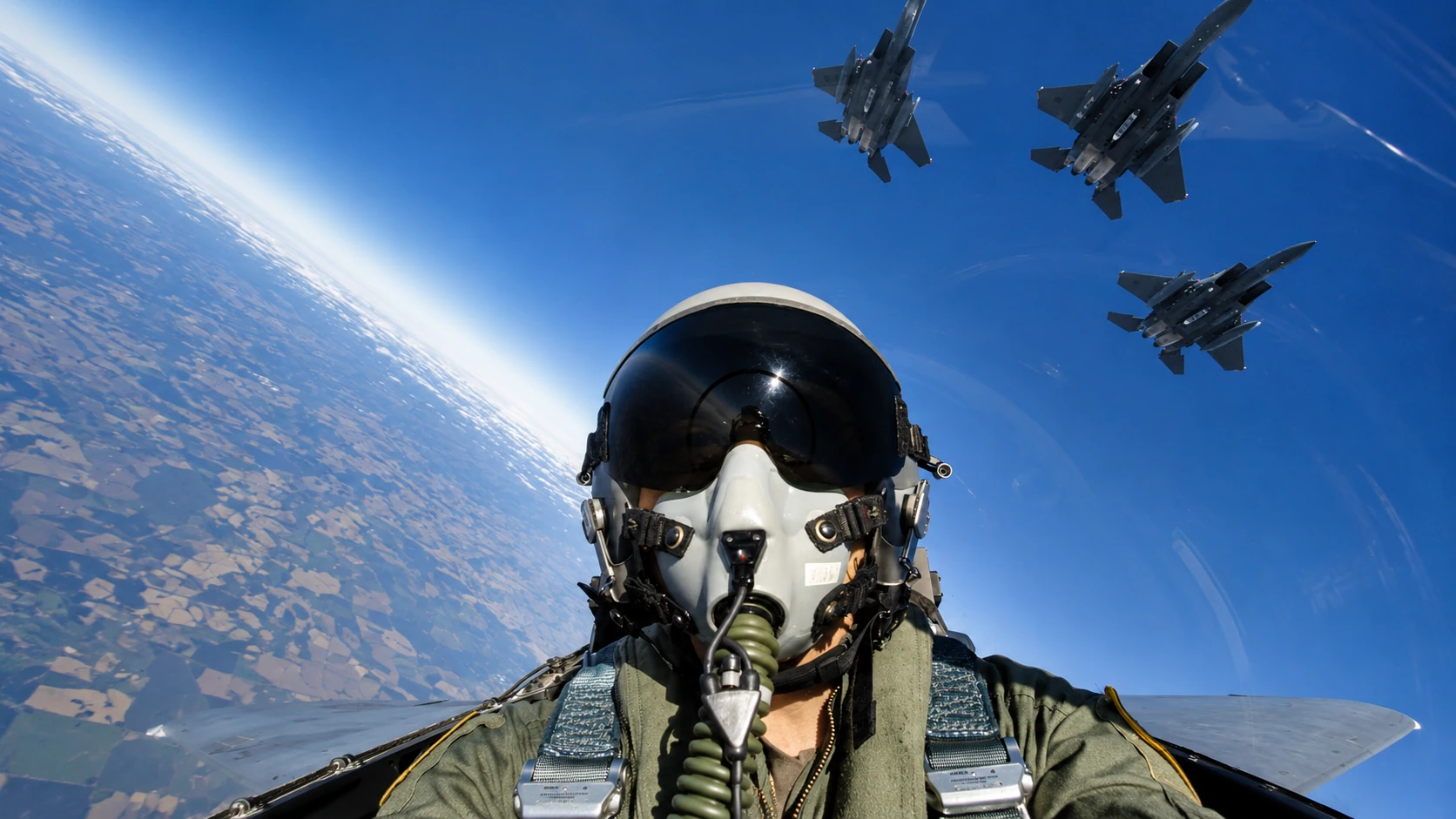 A fighter pilot in the cockpit of a fighter jet